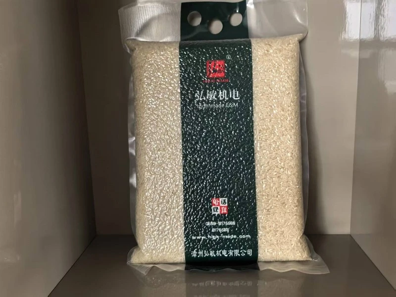Semi-Automatic Double-Side Rice Vacuum Shaping & Packaging Machine Semi-Automatic Double-Side Rice Vacuum Shaping & Packaging Machine